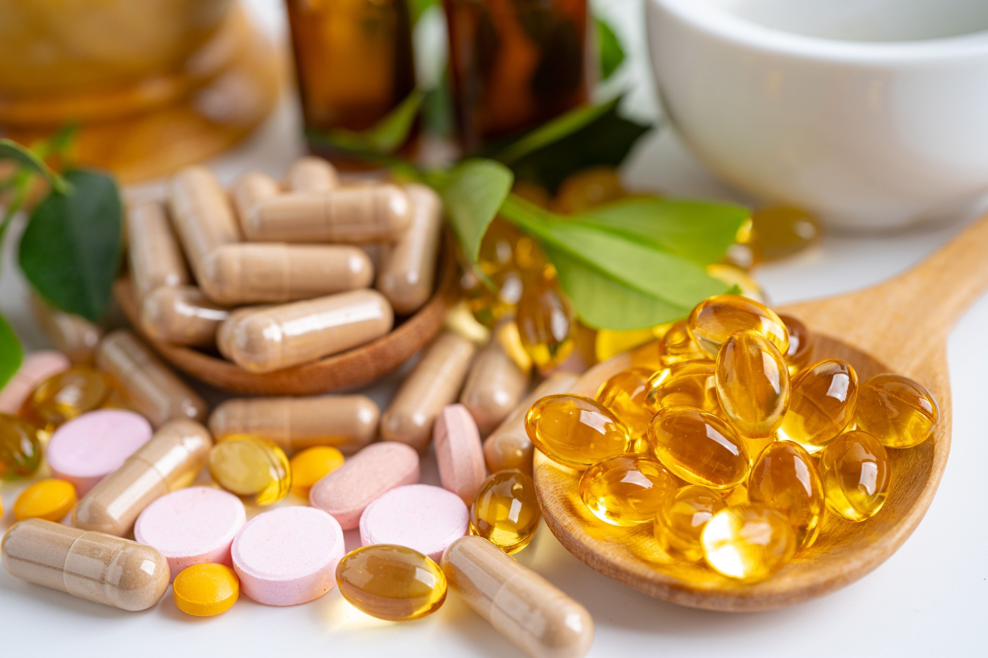Alternative medicine herbal organic capsule with vitamin E omega 3 fish oil, mineral, drug with herbs leaf natural supplements for healthy good life.